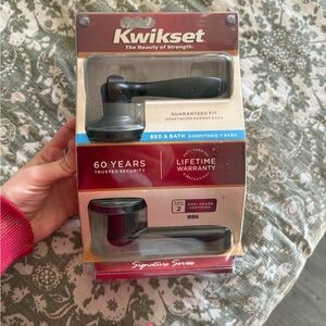 New in package Kwikset Bed & Bath Door Handle Black With Lock